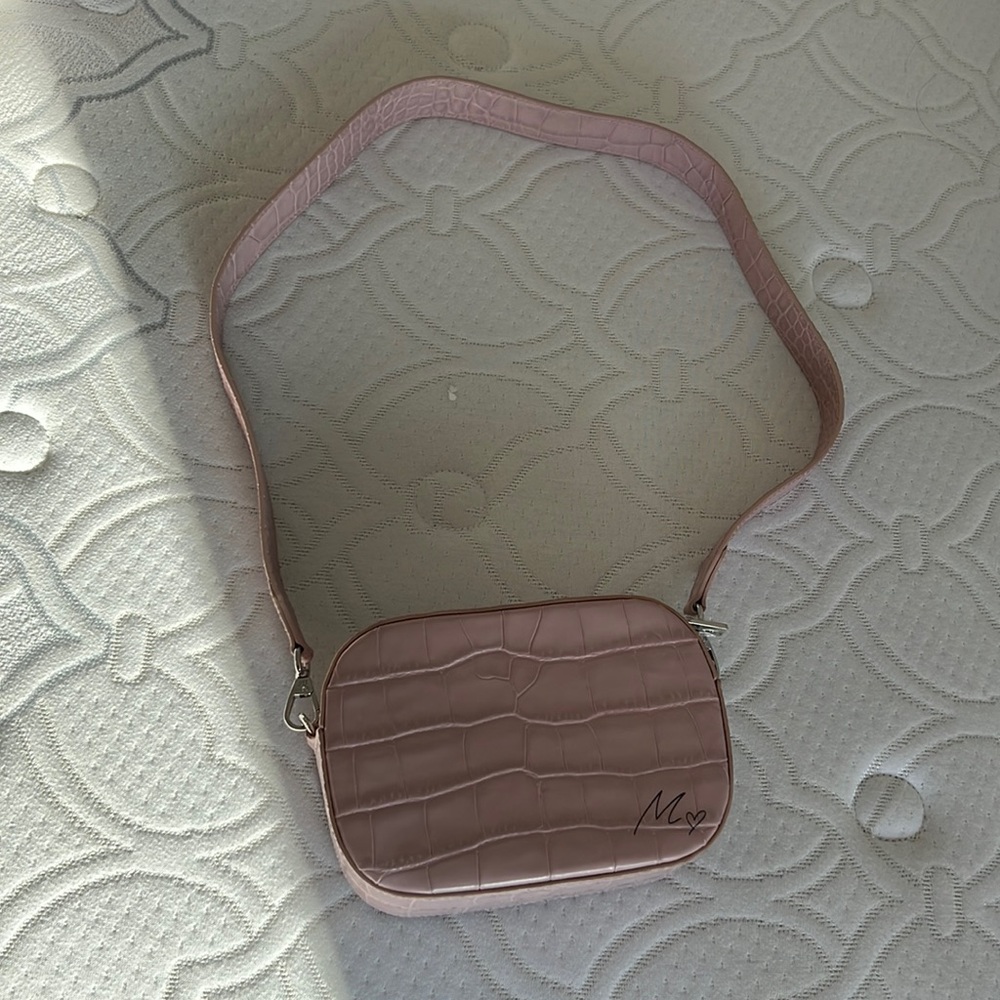 Pink leather camera bag